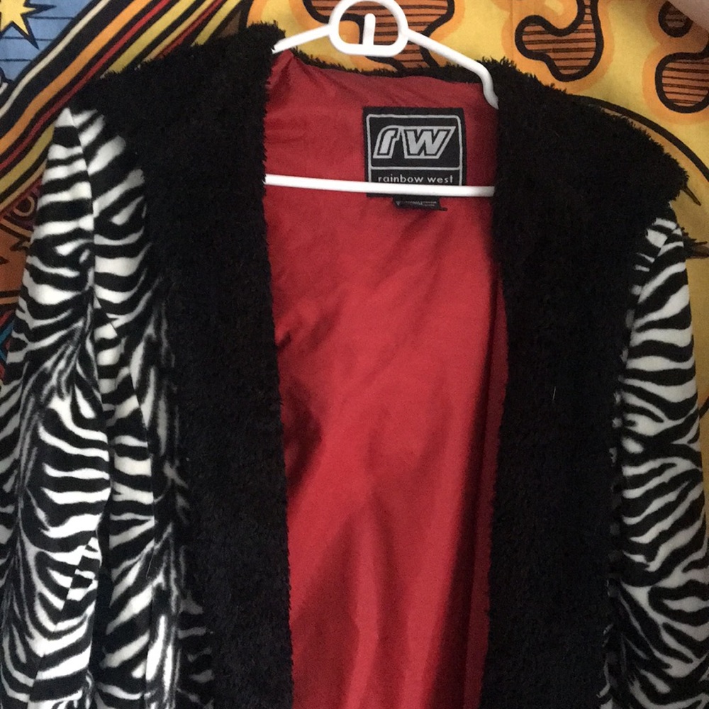 zebra print and black faux fur coat